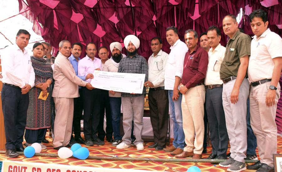 State-topper-Arpandeep-was-felicitated-by-Education-Board-Chairman-Dr.-Pawan-Sharma
