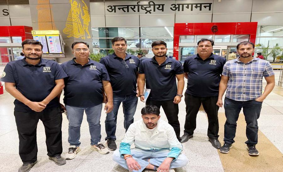 STF-brings-gangster-Dinesh-back-after-deportation-from-Cyprus.